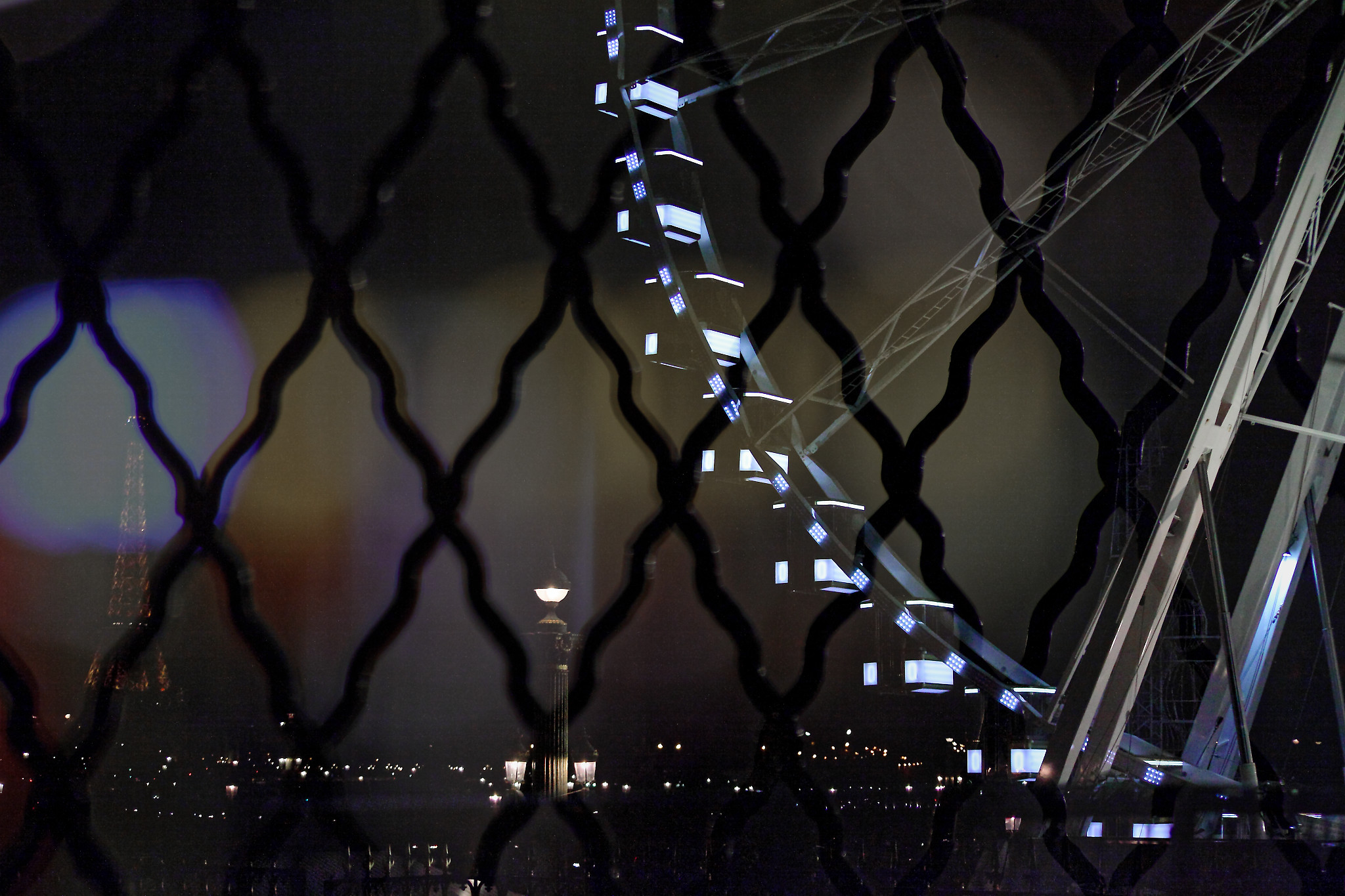 the big wheel behind the fence